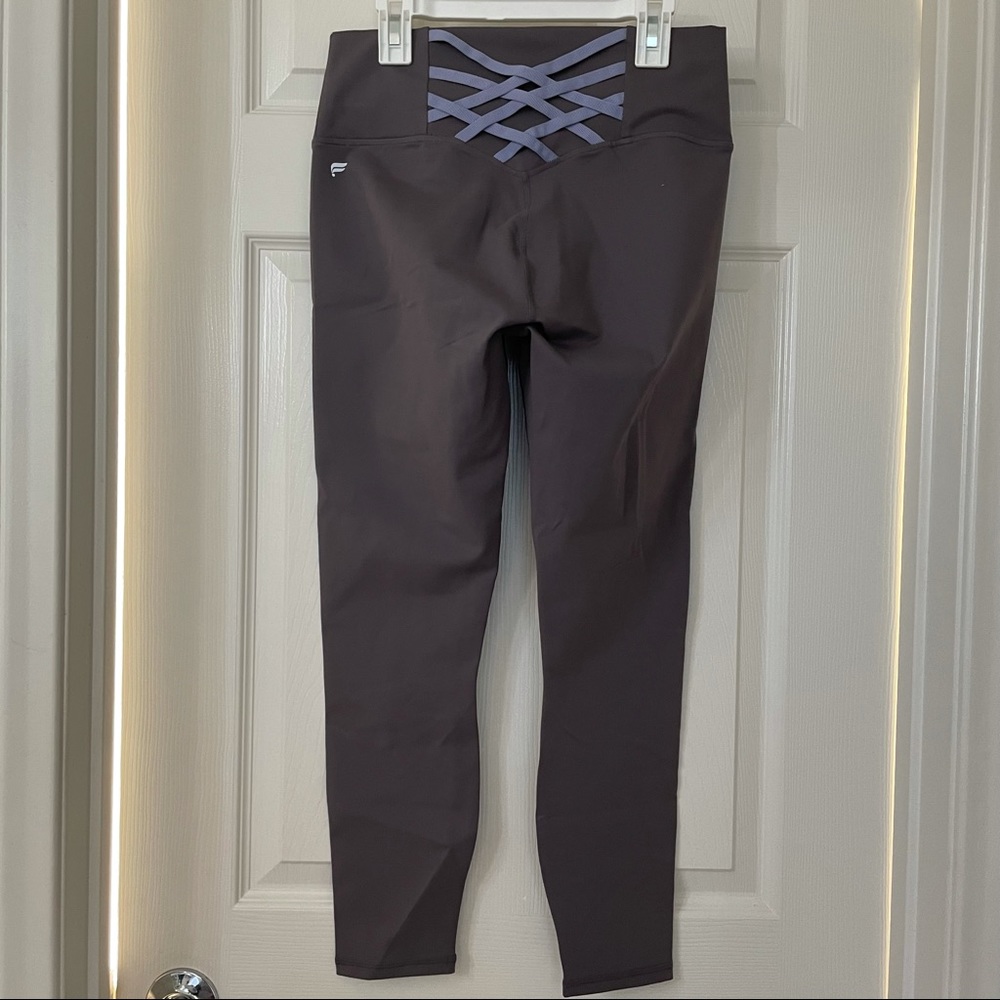 Fabletics leggings with criss-cross detail. NWT